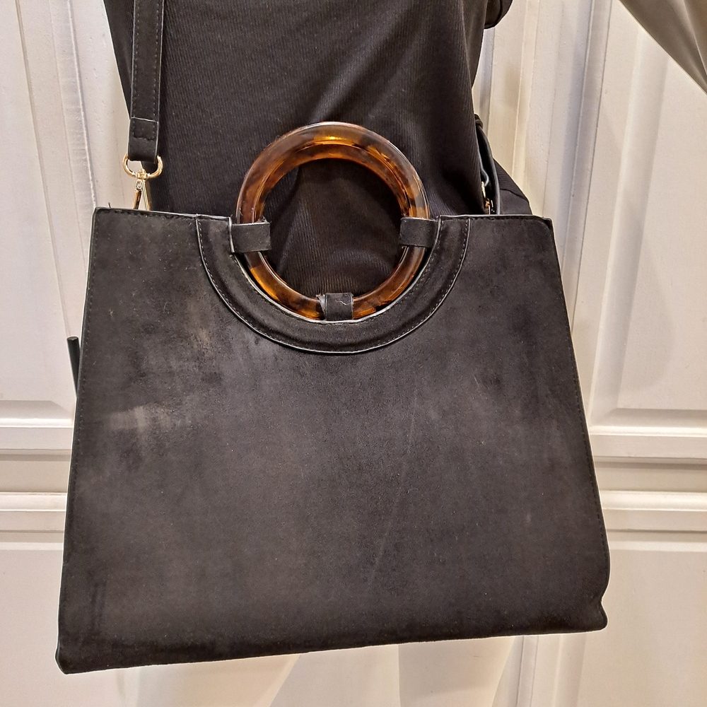 Chic Black Suede Crossbody Bag with Tortoise Shell Circular Handles